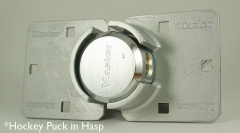 anti theft puck lock system for vending machine