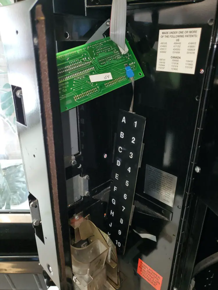 clean and reinstall the keypad AP 113 Snackshop vending machine