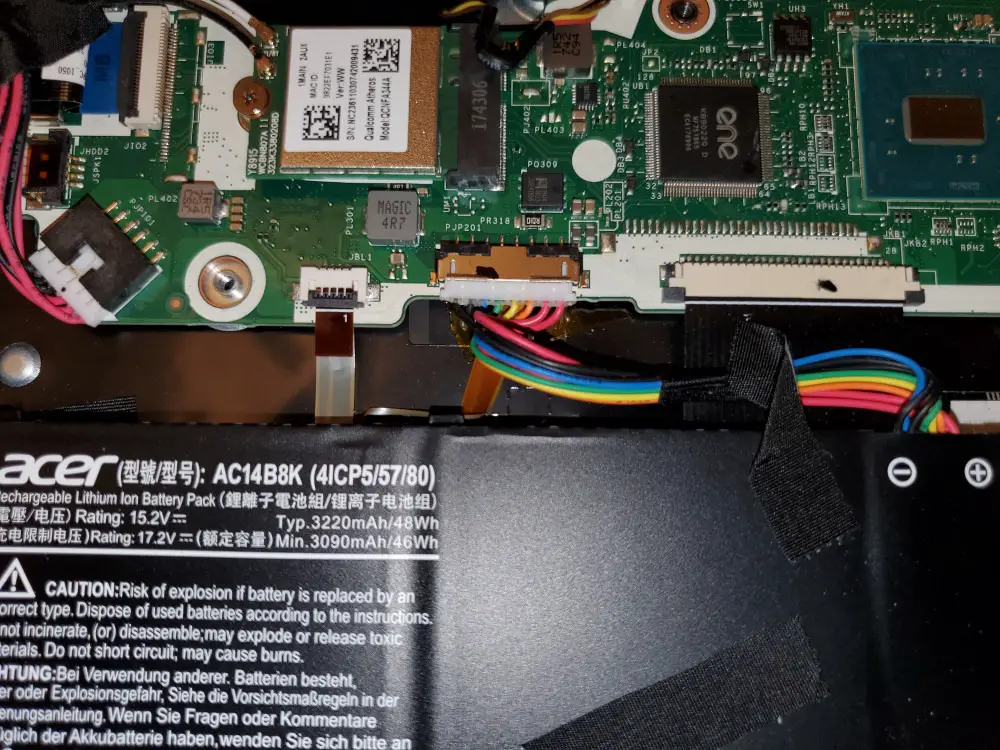 laptop battery cable plugged back to mainboard