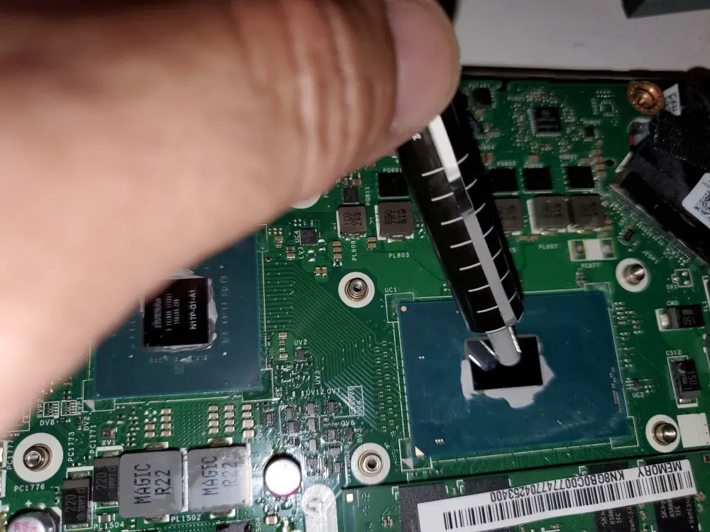 putting the thermal grease on the GPU and CPU